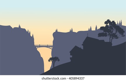 Beautiful house of silhouette on the hills