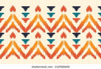 Beautiful ikat art. Ethnic Seamless pattern in tribal, folk embroidery, and abstract art. Aztec geometric chevron ornament print. Design for carpet, wallpaper, clothing, wrapping, fabric.