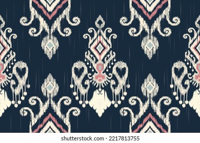 Beautiful Ikat paisley embroidery on blue background.geometric ethnic oriental seamless pattern traditional.Aztec style abstract vector illustration.design for texture,fabric,clothing,wrapping,carpet.