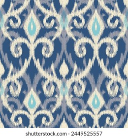 Beautiful Ikat paisley embroidery on blue background.geometric ethnic oriental seamless pattern traditional.Aztec style abstract vector illustration.design for texture,fabric,clothing,wrapping,carpet