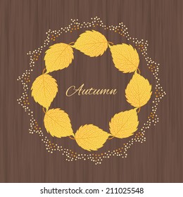 Beautiful  illustration  with autumn leaves on wooden background