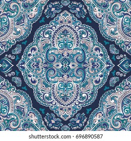Beautiful Indian floral paisley seamless ornament pattern. Ethnic Mandala. Vector Henna tattoo style. Can be used for textile, greeting business card background, coloring book, phone case print