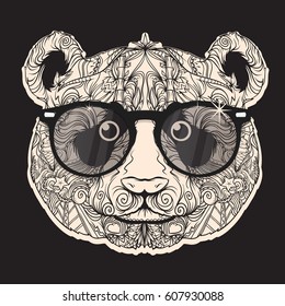 Beautiful Indian panda with styles glasses on face. Black and white vintage version. Isolated on dark background. Can be use for cards, prints or poster.
