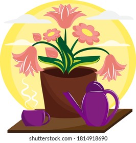 Beautiful indoor flower in a pot. And next - watering can and a cup of tea.