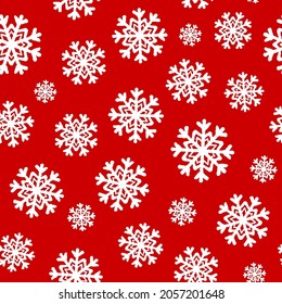 Beautiful inky white snowflakes isolated on red background. Cute monochrome festive new year seamless pattern. Vector simple flat graphic hand drawn illustration. Texture.