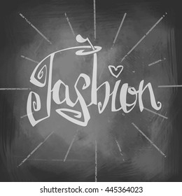 Beautiful inscription on the chalk board. The word "fashion". 