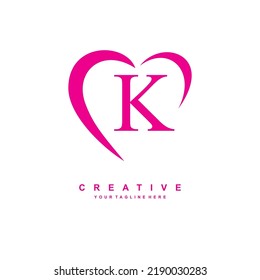 beautiful K logo design with pink love. letter K logo with heart. beauty logos. suitable for product promotion, business marketing, etc