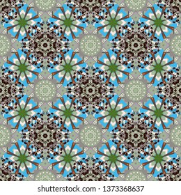 Beautiful kaleidoscope seamless pattern. Vector abstract kaleidoscope background in blue, gray and green colors. Unique kaleidoscope design. Multicolor mosaic texture.