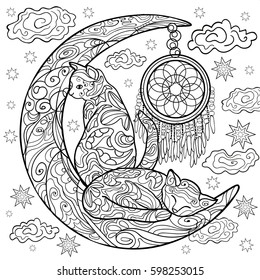 Beautiful kittens. Vector illustration. Cat sleeps on the moon. Doodle. Coloring book for adults. Black and white in zentangle style. Little kitten sleeps. Dreamcatcher. Shaman. Anti stress. Dream. 