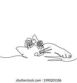 A beautiful kitty with a flower is sleeping sweetly. A continuous line. Vector illustration drawn with a single line.