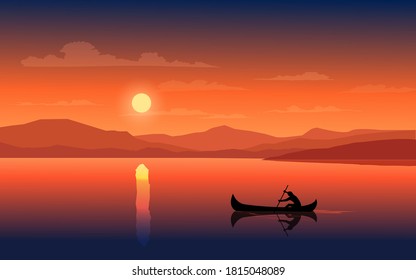 Hermosa puesta de sol del lago con el hombre remando en la canoa