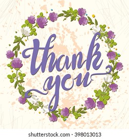 beautiful lettering. phrase. Thank you. calligraphy. wreath of wildflowers. bright clover
