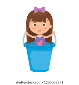 beautiful little girl in plastic bucket