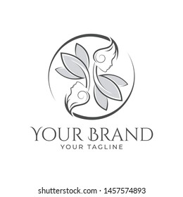 beautiful logo template of woman's face combined with leaf and flower upside down