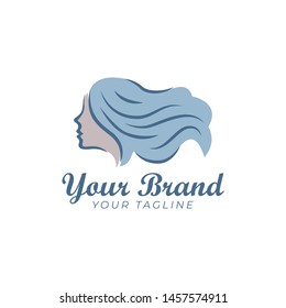 beautiful logo template of woman's face and long waving hair in blue color
