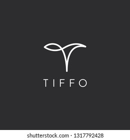 Beautiful Logotype design for luxury company branding. Creative modern elegant trendy unique artistic black and white color T initial based letter icon logo.