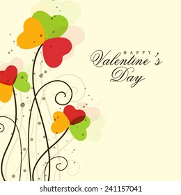 Beautiful love card design with flowers made by colorful hearts for Happy Valentine's Day celebrations.