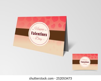 Beautiful love greeting card decorated by pink hearts for Happy Valentines Day celebration on shiny grey background.