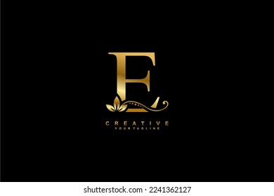 
beautiful luxury logo design initial golden letter E with gorgeous flourish ornament. monogram typography letter E with gold leaf and floral ornament decoration