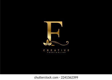 
beautiful luxury logo design initial golden letter FA with gorgeous flourish ornament. monogram typography letter F with gold leaf and floral ornament decoration