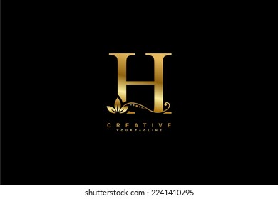 
beautiful luxury logo design initial golden letter H with gorgeous flourish ornament. monogram typography letter H with gold leaf and floral ornament decoration