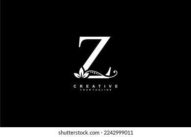 beautiful luxury logo design initial white letter Z with gorgeous flourish ornament. monogram typography letter Z with gold leaf and floral ornament decoration