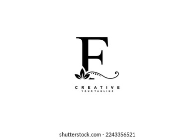 beautiful luxury logo design initial black letter F with gorgeous flourish ornament. monogram typography letter F with black leaf and floral ornament decoration