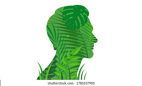Beautiful man face with different plants and large leaves. Male silhouette and floral arrangement with green plants and tropical leaves.The concept of ecology, planet, gardening, veganism.
