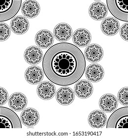 Beautiful Mandala design concept of Rangoli with flower petals, circles and spirals is in Seamless pattern