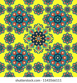 Beautiful mandala pattern with islamic geometric flower seamless on yellow color background.