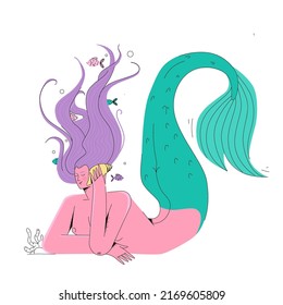 Beautiful mermaid with long hair and fish tail listening to music with seashell.