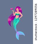 Beautiful mermaid with long pink hair blows a kiss.