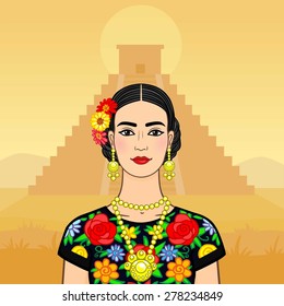Beautiful Mexican woman in a national clothes. A background - a pyramid Maya.
