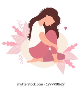 Beautiful modern sad girl with long hair sits hugging her leg on a decorative background with tropical leaves. Vector illustration