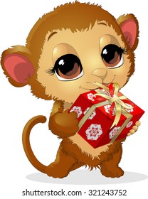 beautiful monkey, which holds in paws a delicious box