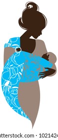 Beautiful mother silhouette with baby in a sling