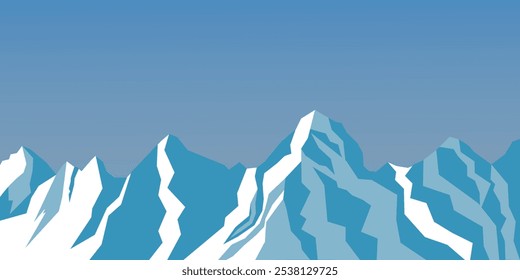 Beautiful mountain landscape, panorama of snow-covered mountains on the background of clear sky.