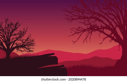 Beautiful mountain panorama at twilight from the village with the silhouette of dry trees around it. Vector illustration of a city