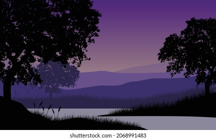 Beautiful mountain views from the riverbank at dusk with the silhouettes of large trees around it. Vector illustration of a city