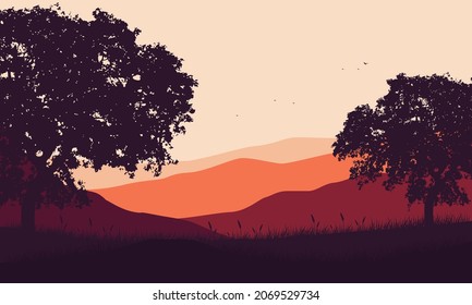 Beautiful mountains view with the tree silhouettes from the countryside at dusk in the afternoon. Vector illustration of a city