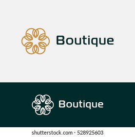 Beautiful ornamental Boutique logo with leaf and flower