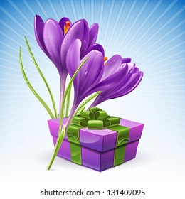 Beautiful package with a gift and flowers of spring