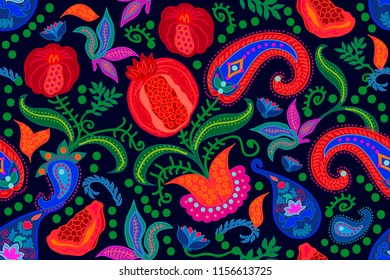 Beautiful paisley pattern. Seamless vector print with pomegranates, leaves and flowers on black background. Design inspired by Turkish and Persian art.