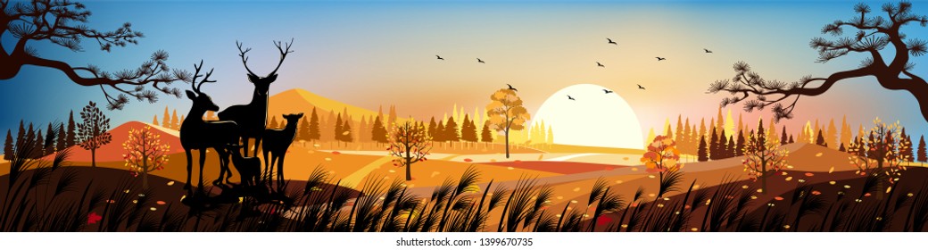 Beautiful panorama landscapes of Countryside in autumn, Panoramic of mid autumn with sunset, Silhouette of deers in the forest during autumn season