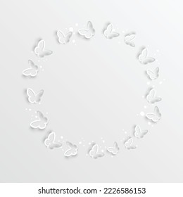 Beautiful paper butterfly on a white background. Round frame. Greeting card with paper butterfly. Wedding decorations. Greeting card template, blank floral wall decor.