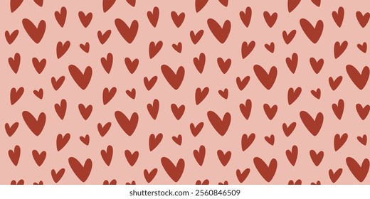 Beautiful passionate seamless pattern with hand drawn hearts on pink background. Romantic holiday print for textile, packaging, wedding and Valentine design. Vector graphics