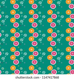 Beautiful pattern with orange, grapefruit and ice cubes.