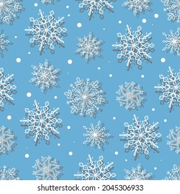 Schönes Muster weißer Schneeflocken auf blauem Hintergrund für Winterdesign. Sammlung von Weihnachtsneujahr. Silhouetten aus Kristallschneeflocken gefroren. Moderne Designerwohnung. Wallpaper für Feiertage.
