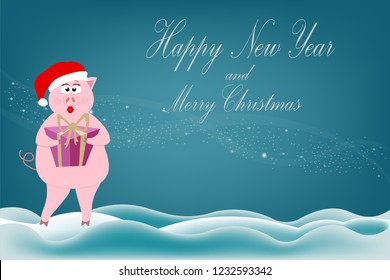A beautiful pig girl pink stands in the snow and holds a gift box in a hat Santa Claus with a golden bow for the New Year and Christmas 2019 in the winter in December on a blue background