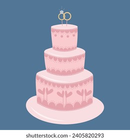 Hermosa torta de bodas rosa con dos anillos encima.